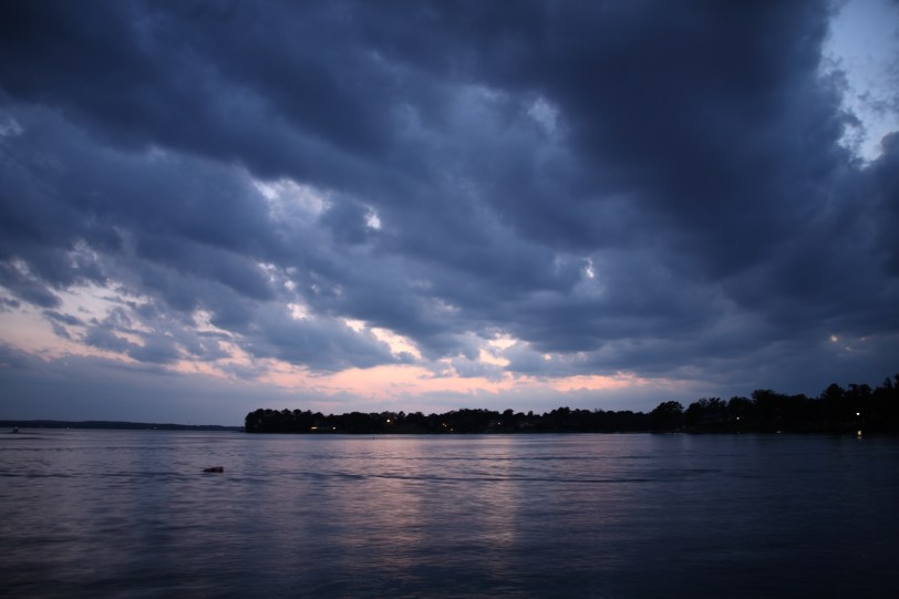 dark blue clouds over Lake Murray in evening